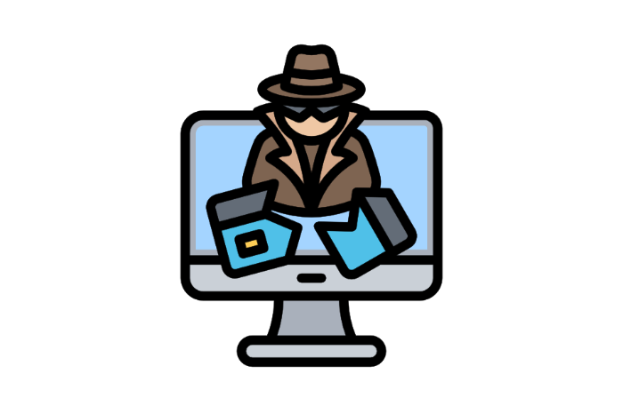 man in disguise with hat and and trenchcoat. Man is inside a computer holding devices